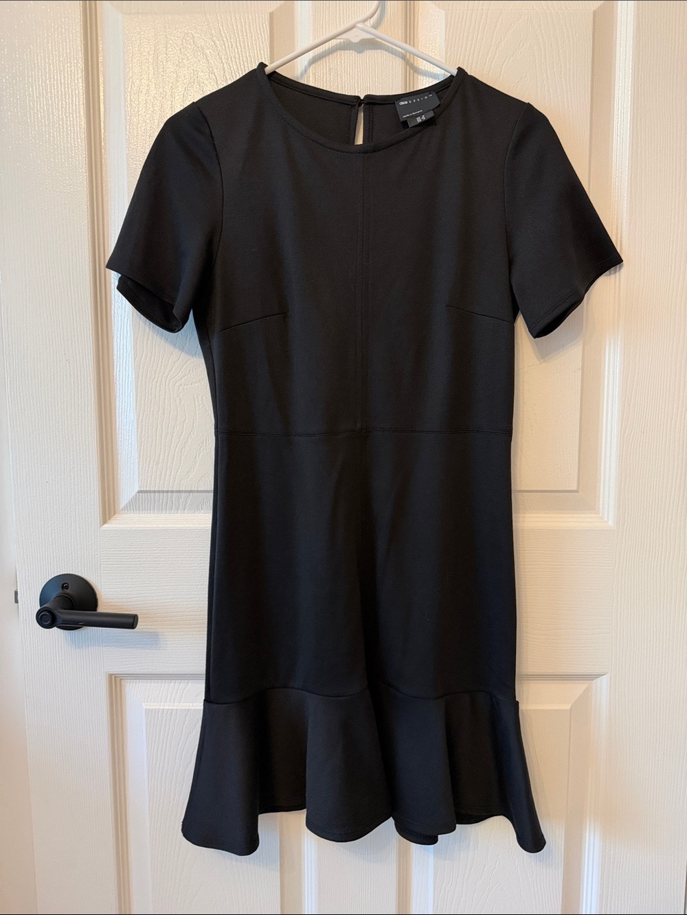 ASOS DESIGN short sleeve ponte mini dress with pep hem in black